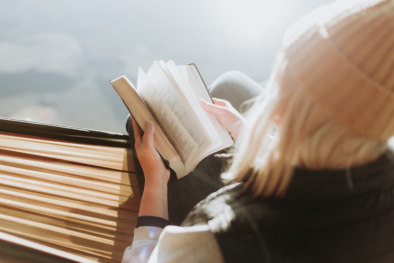 Woman reading book. Photo by Priscilla Du Preez on Unsplash